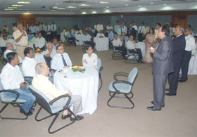 addressing the customers during the Customer meet